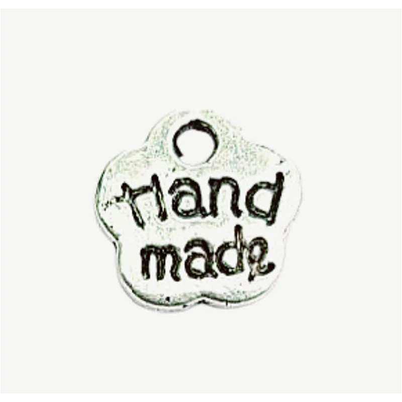 8mm-ea antik ezüst virág medál &quot;Hand made&quot; felirattal